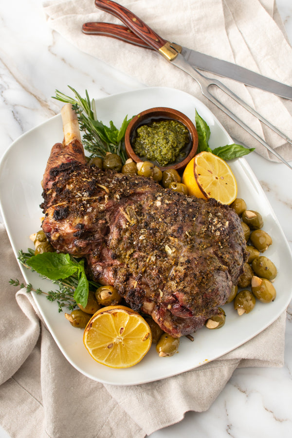 Pesto Roasted Lamb with Garlic Stuffed Olives 